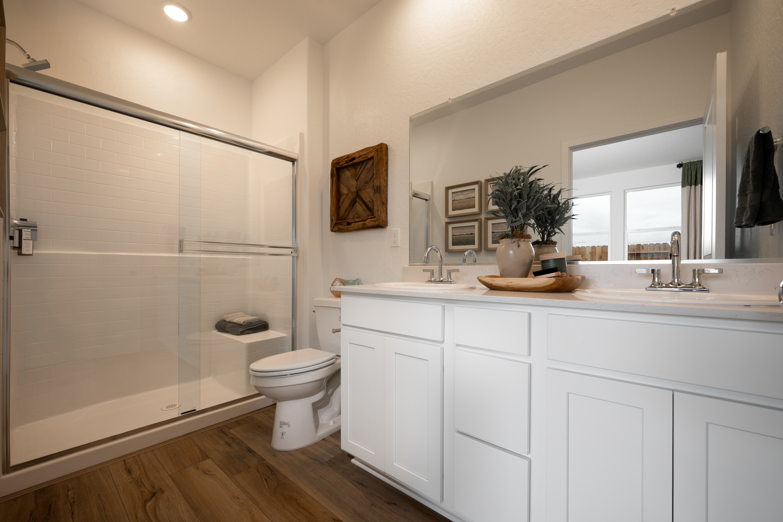 A bathroom with a glass shower.
