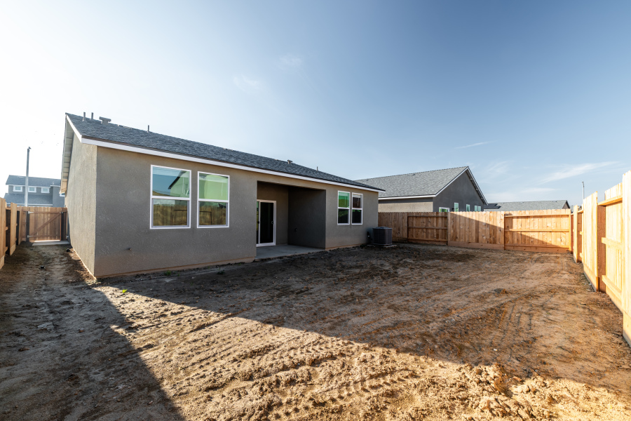 A house with a fence around it.