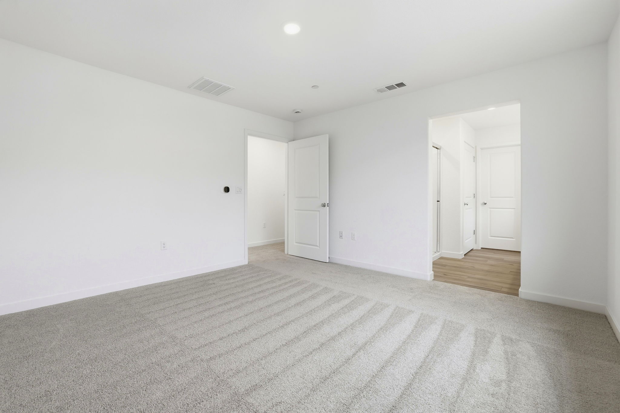 A room with white doors.