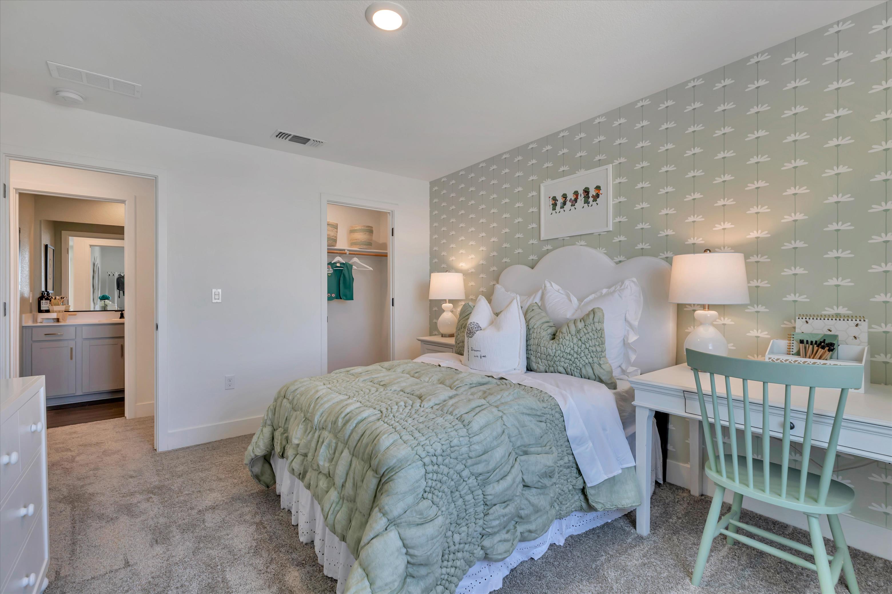 A bedroom with two beds.