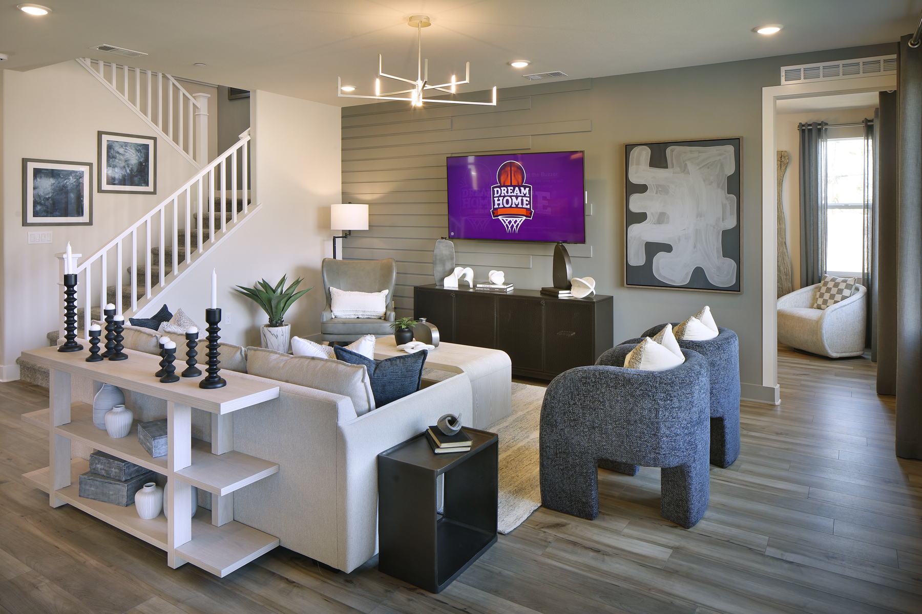 A living room with a tv and couches.