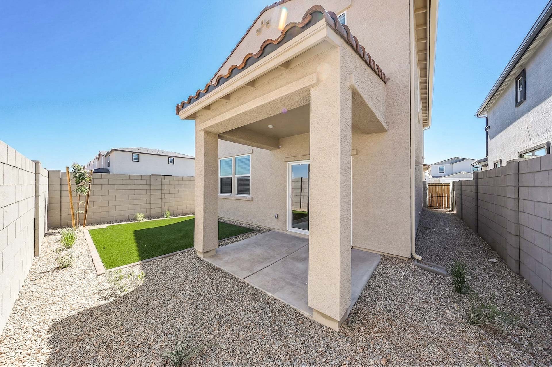 A building with a stone walkway.