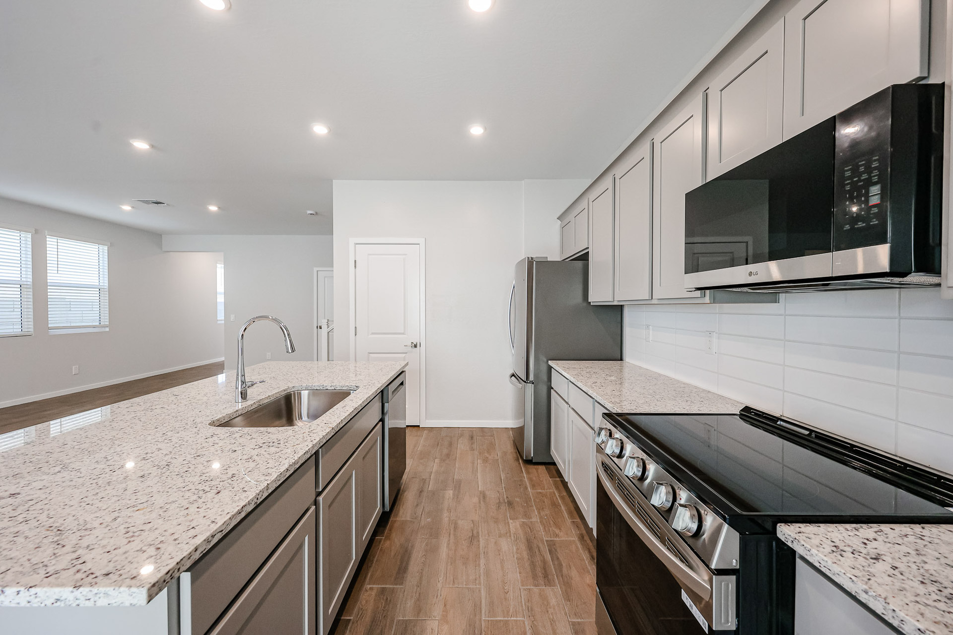 A kitchen with black appliances.
