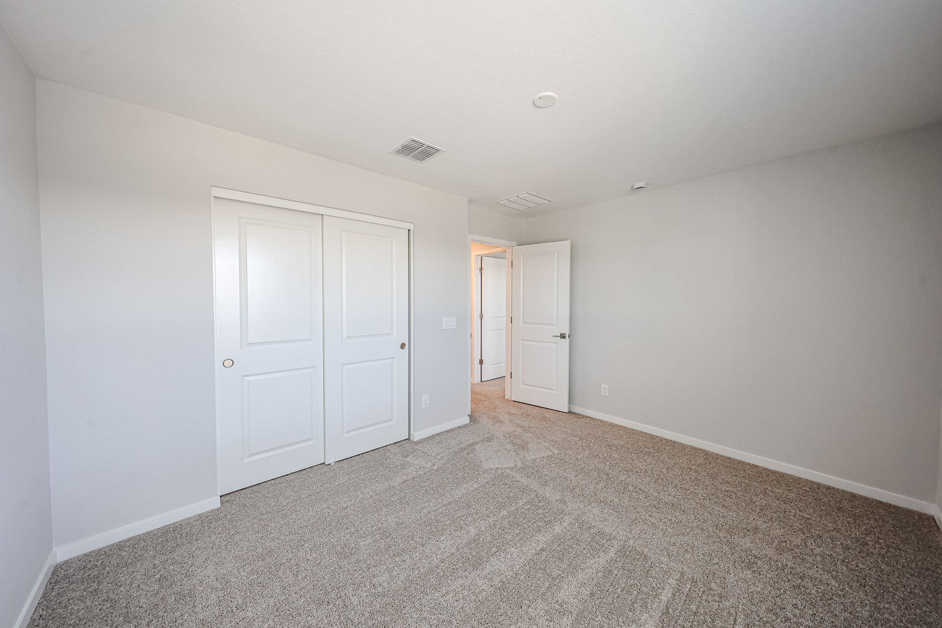 A room with white doors.