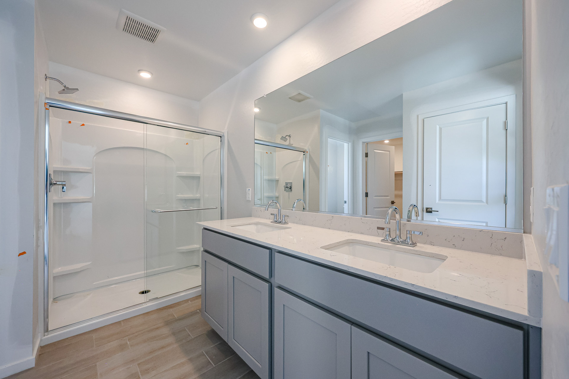 A bathroom with a glass shower.