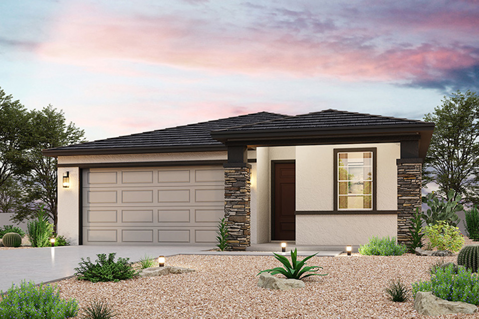 A house with a gravel driveway.