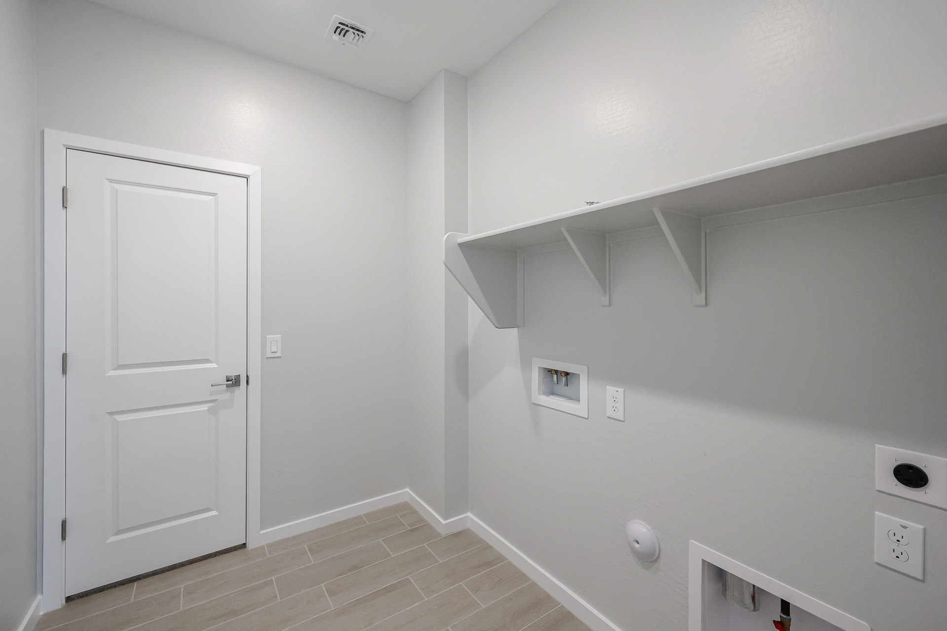 A white door in a room.