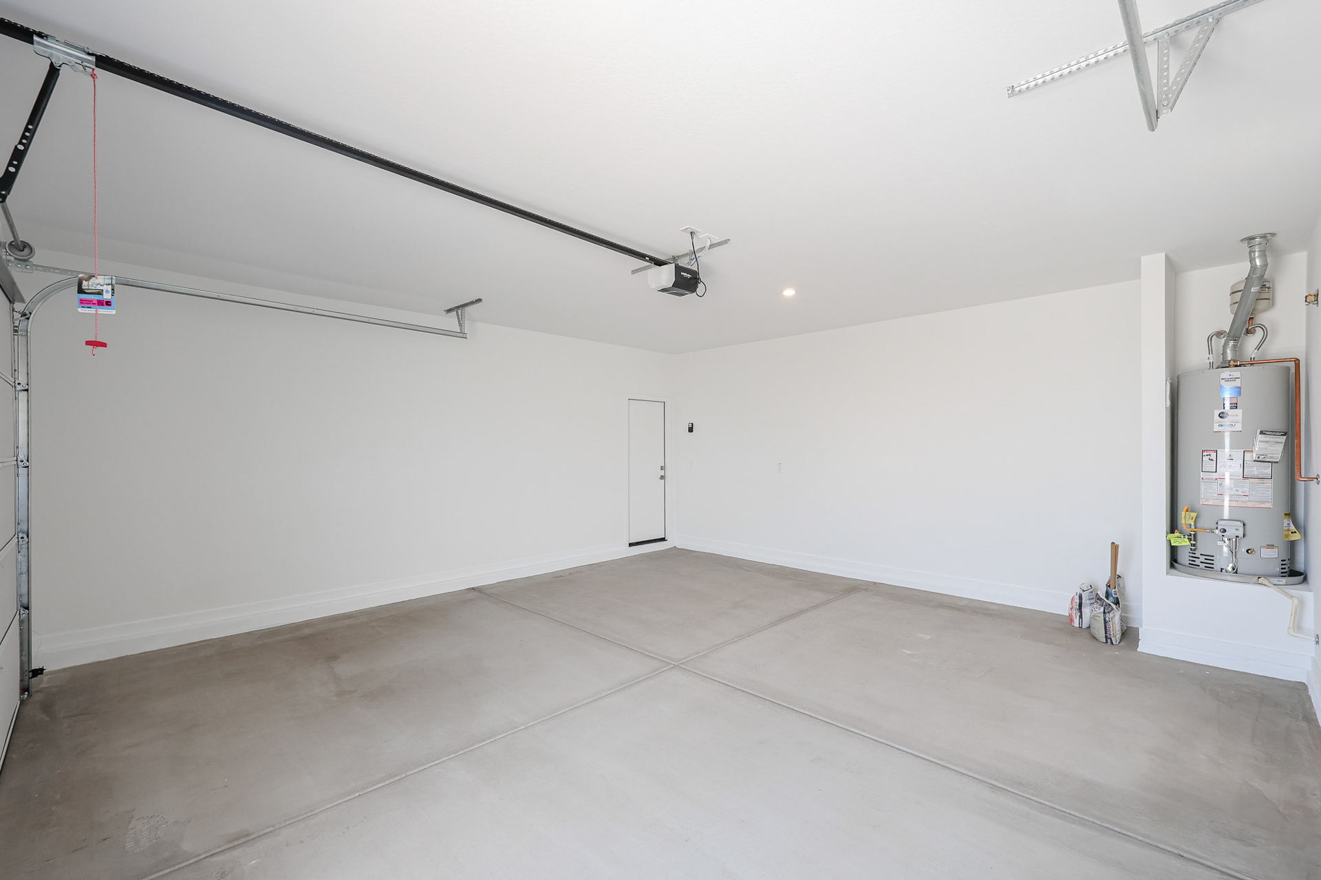 A room with a white wall and a white floor.