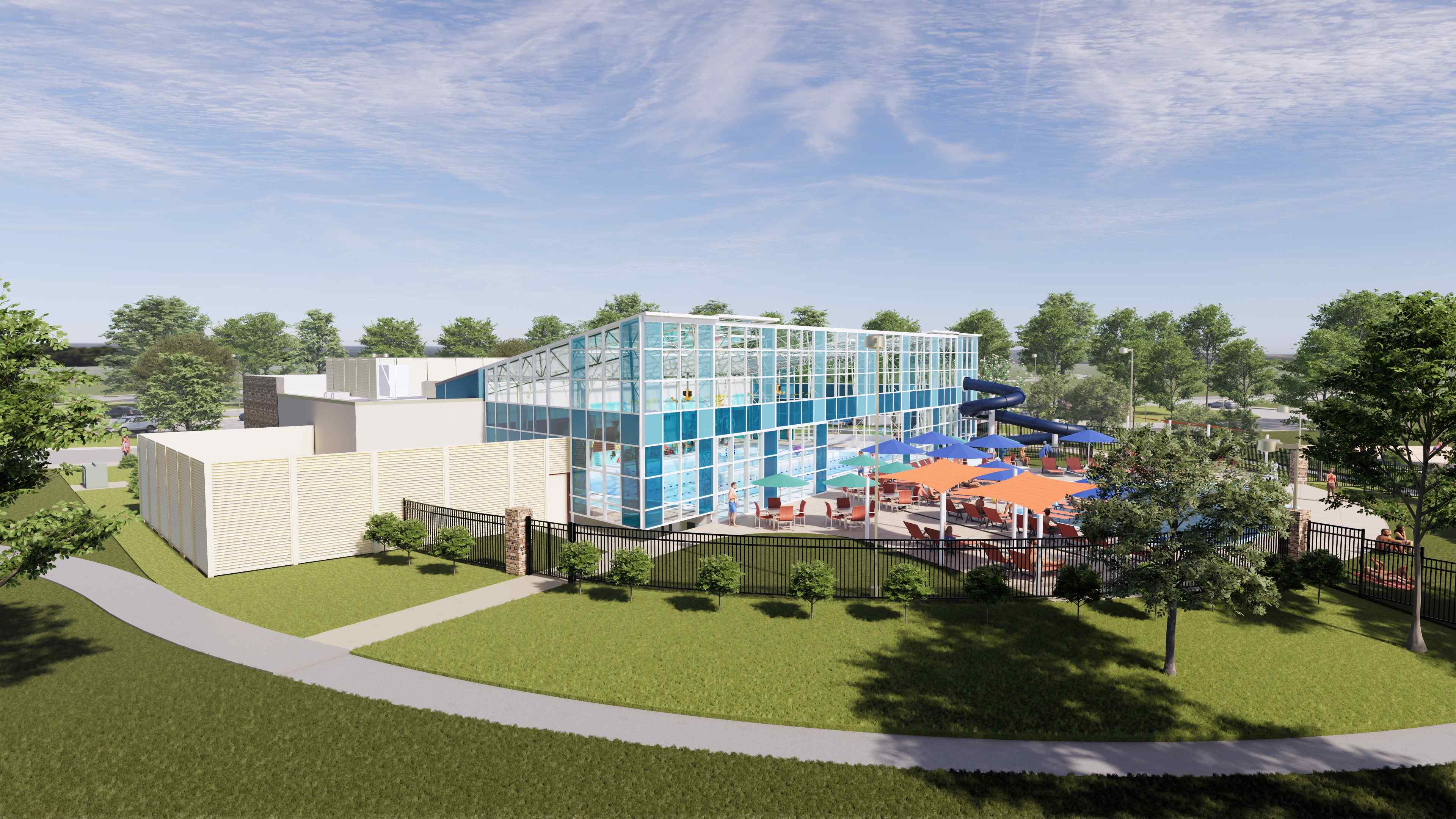 A building with a lawn and trees.