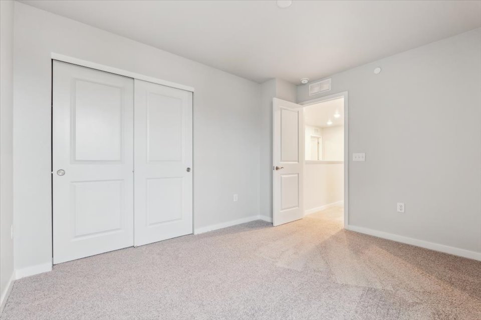 A room with white doors.