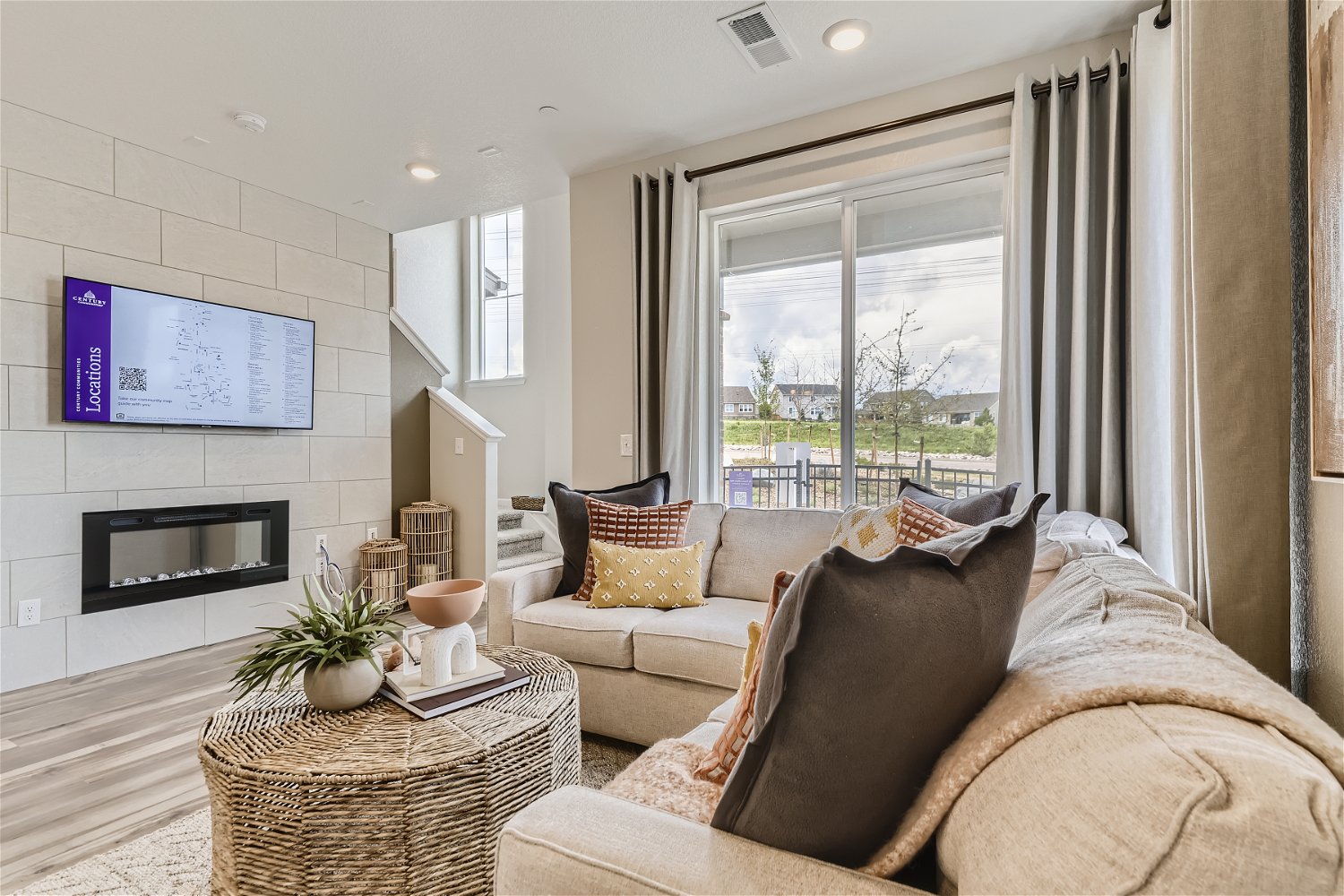 A living room with a fireplace.