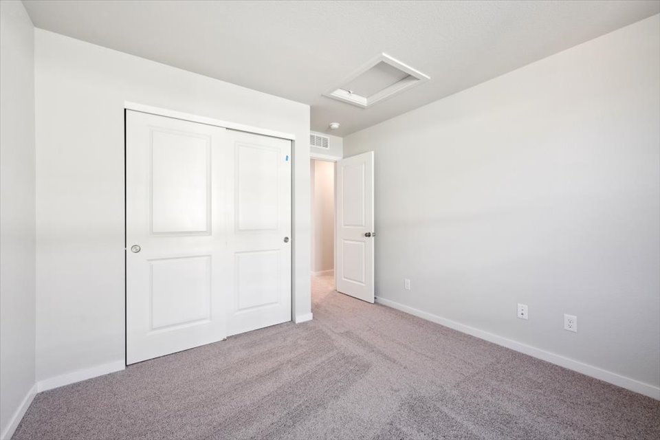 A room with white doors.