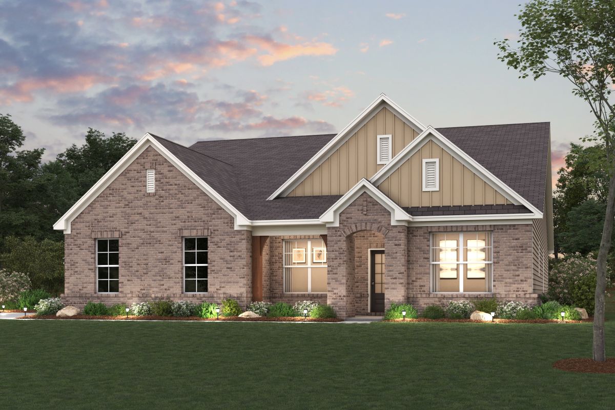 A house with a lawn in front of it.