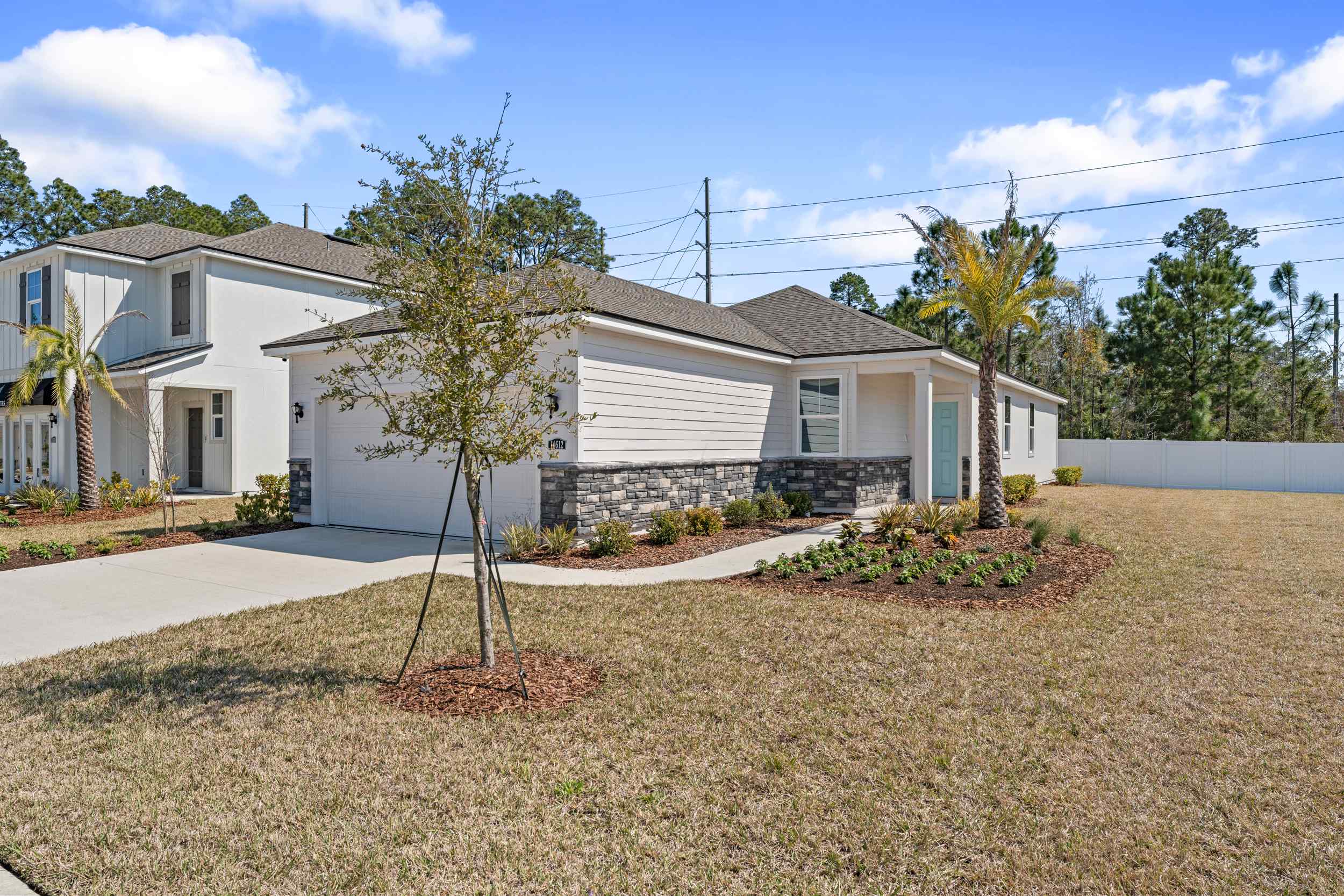 A house with trees and grass.