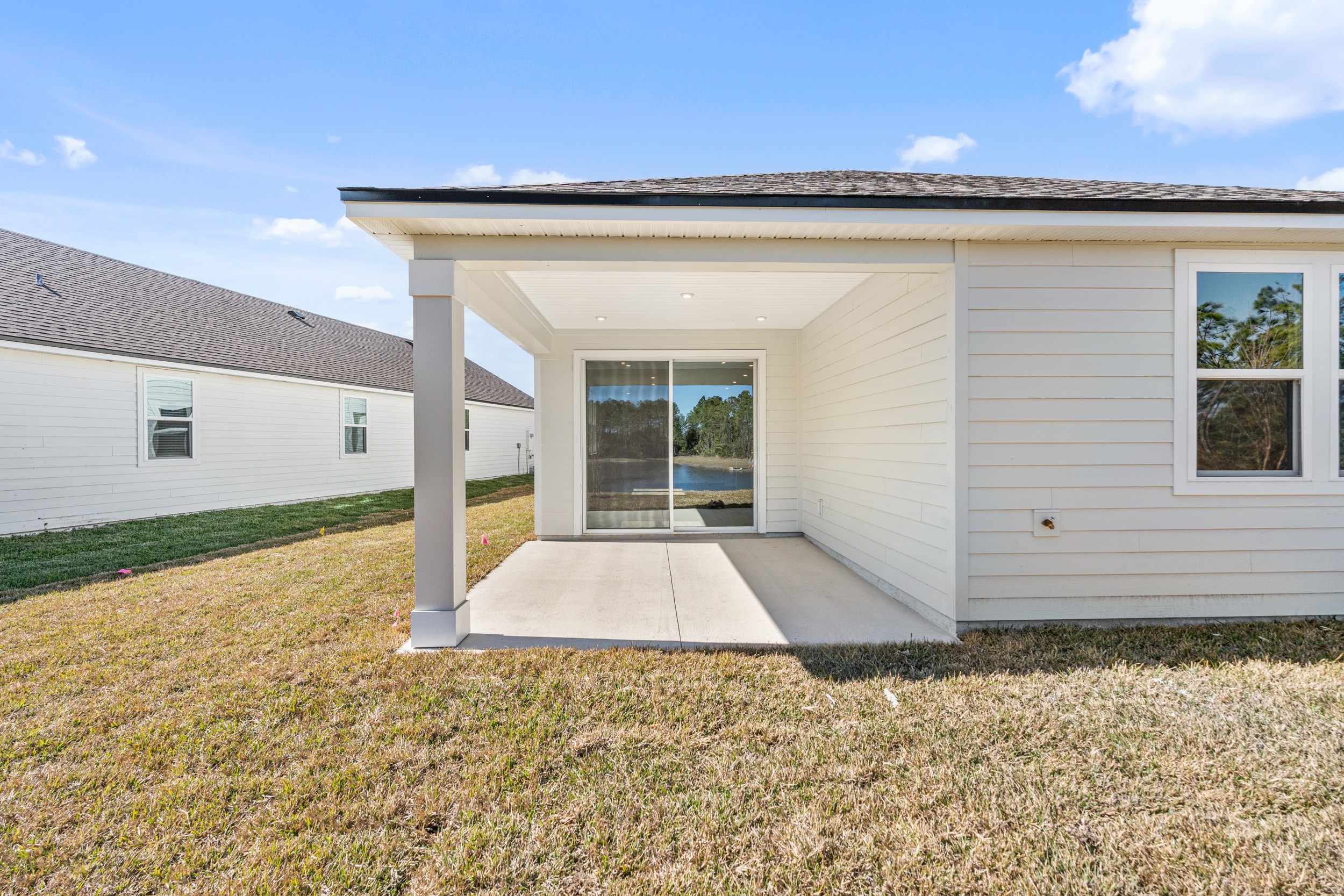 Lot 67 Rear Exterior with Covered Patio at Seminole Palms