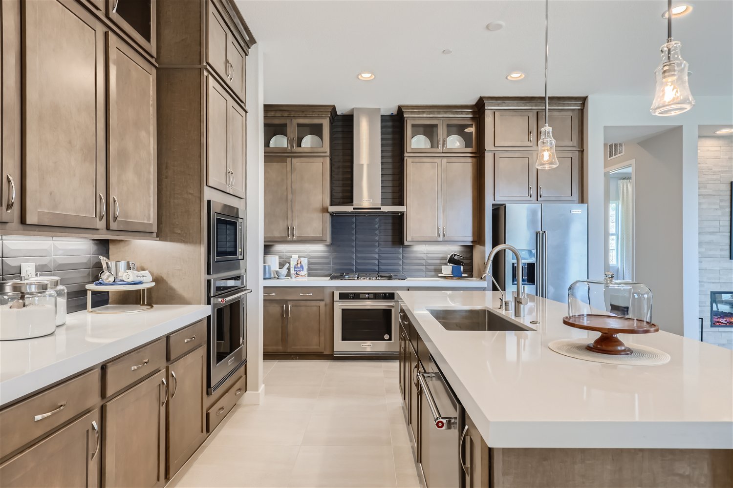 A kitchen with wooden cabinets.
