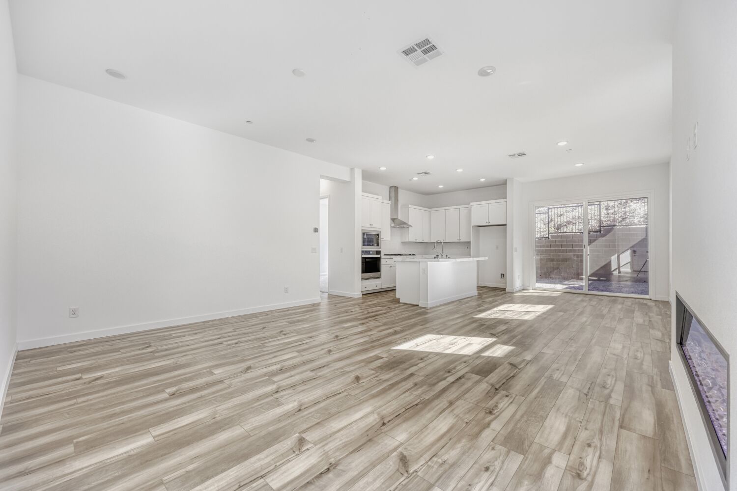 A large empty living room.