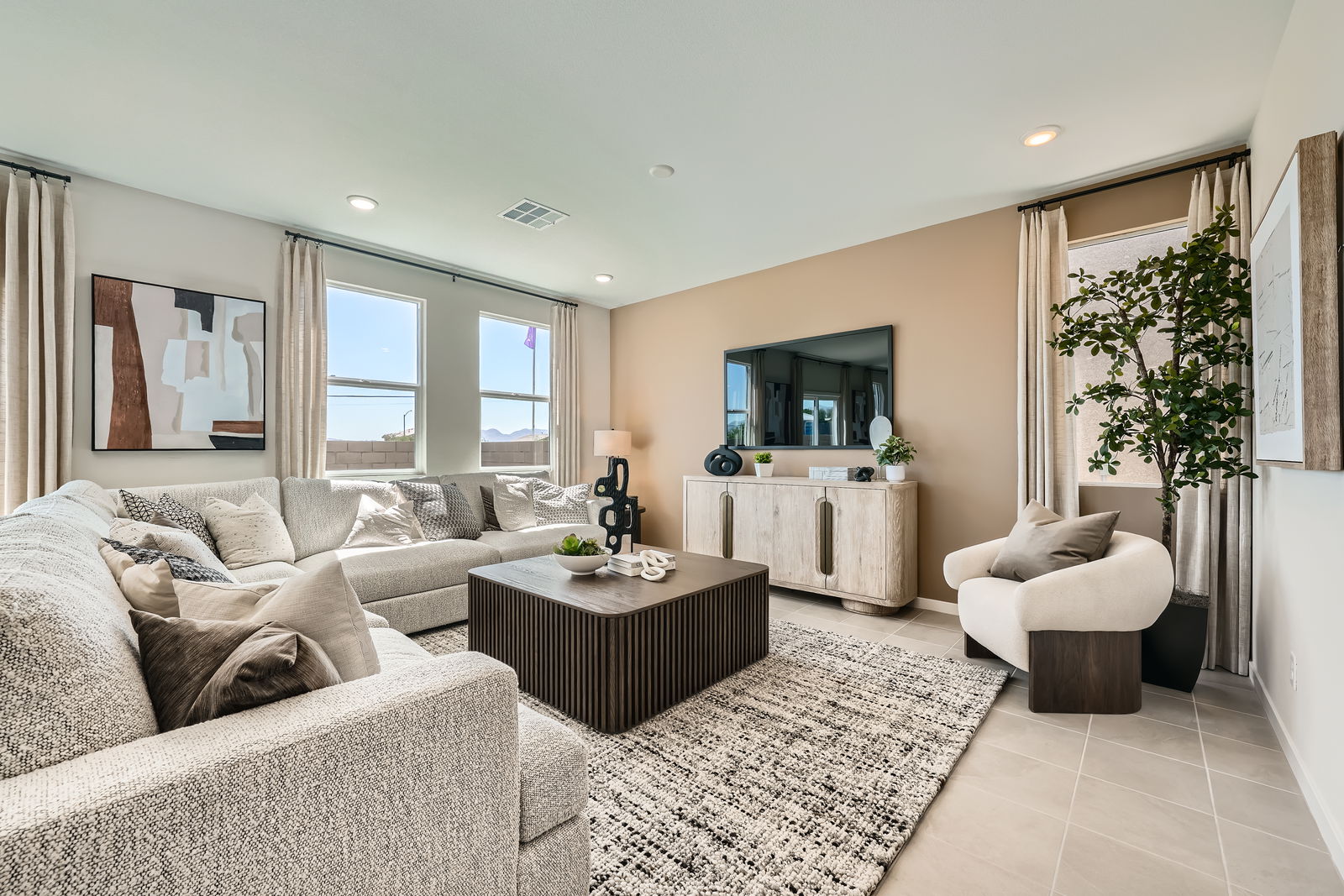 A living room with a large window.