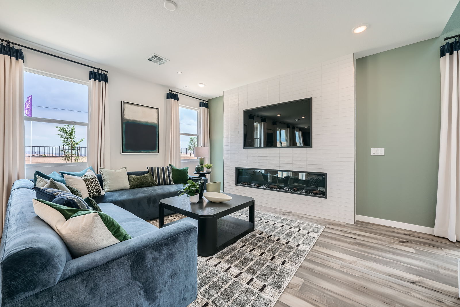 A living room with a fireplace.