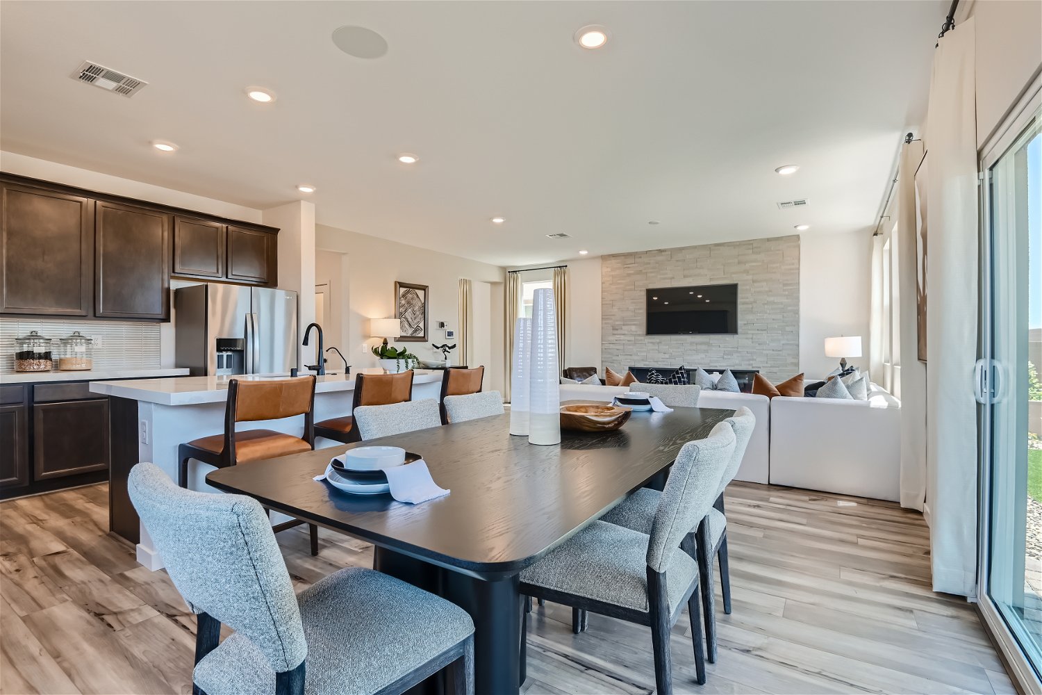 A kitchen with a dining table.