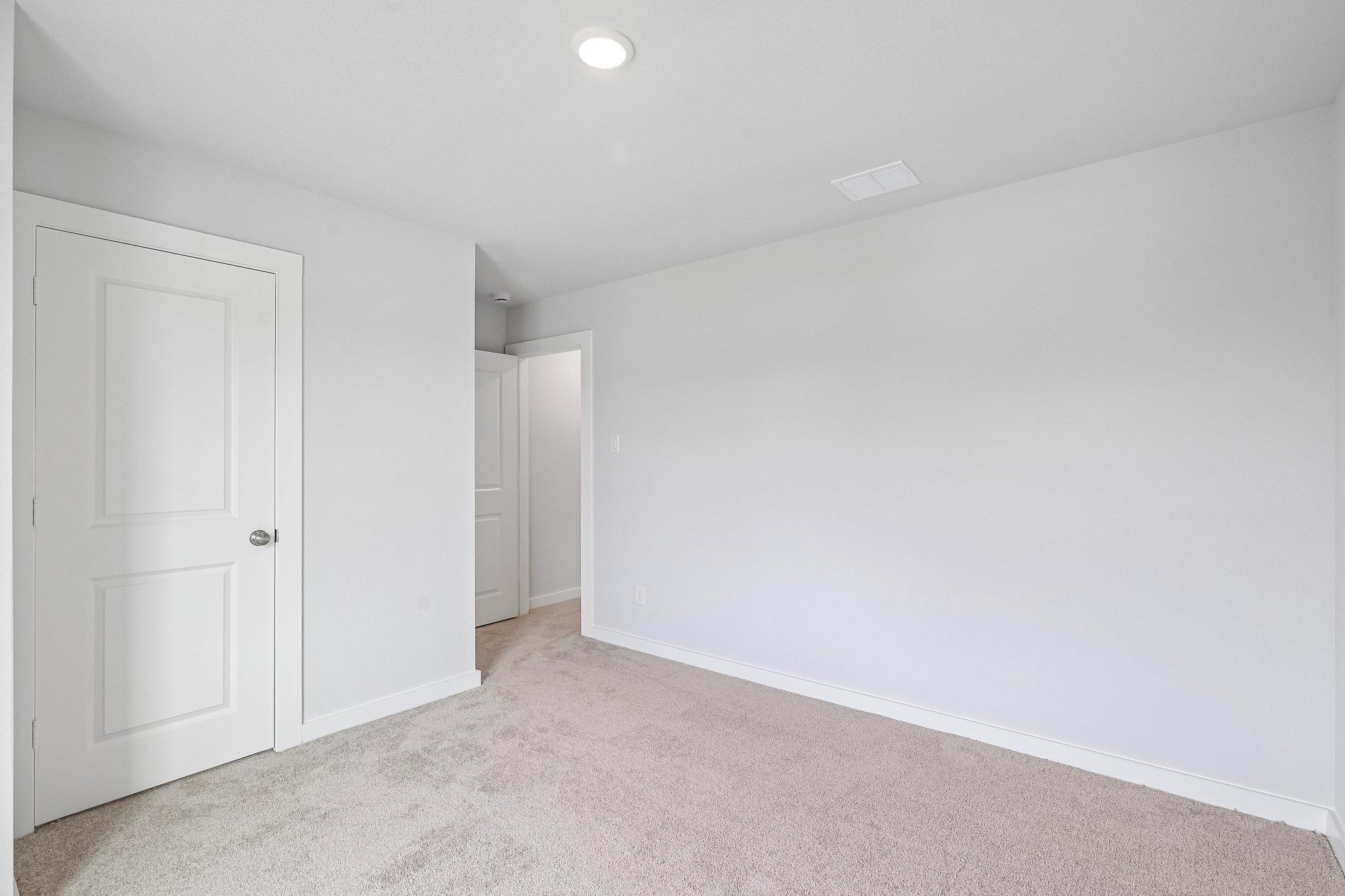 A room with white doors.