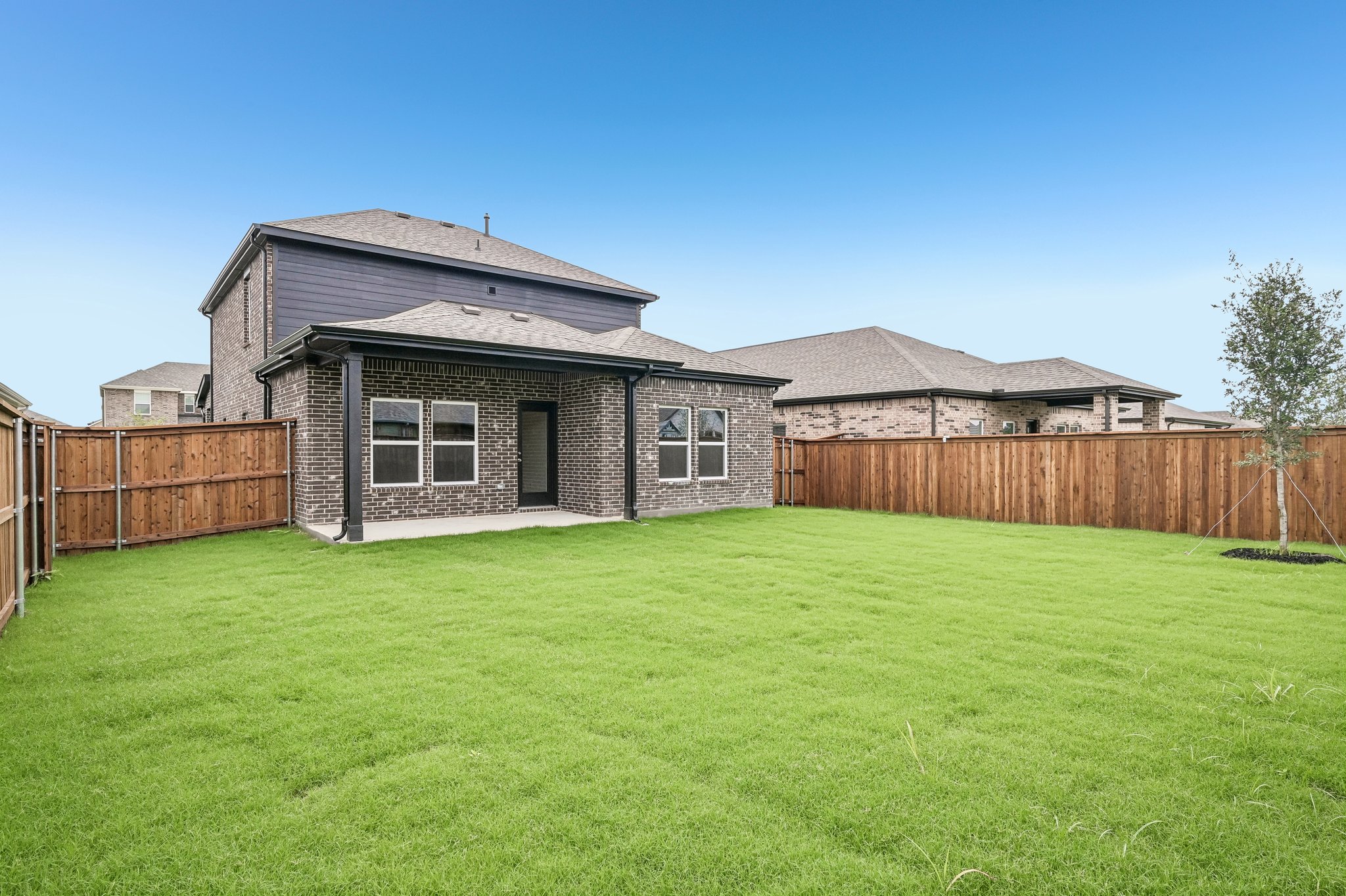 A house with a fence around it.