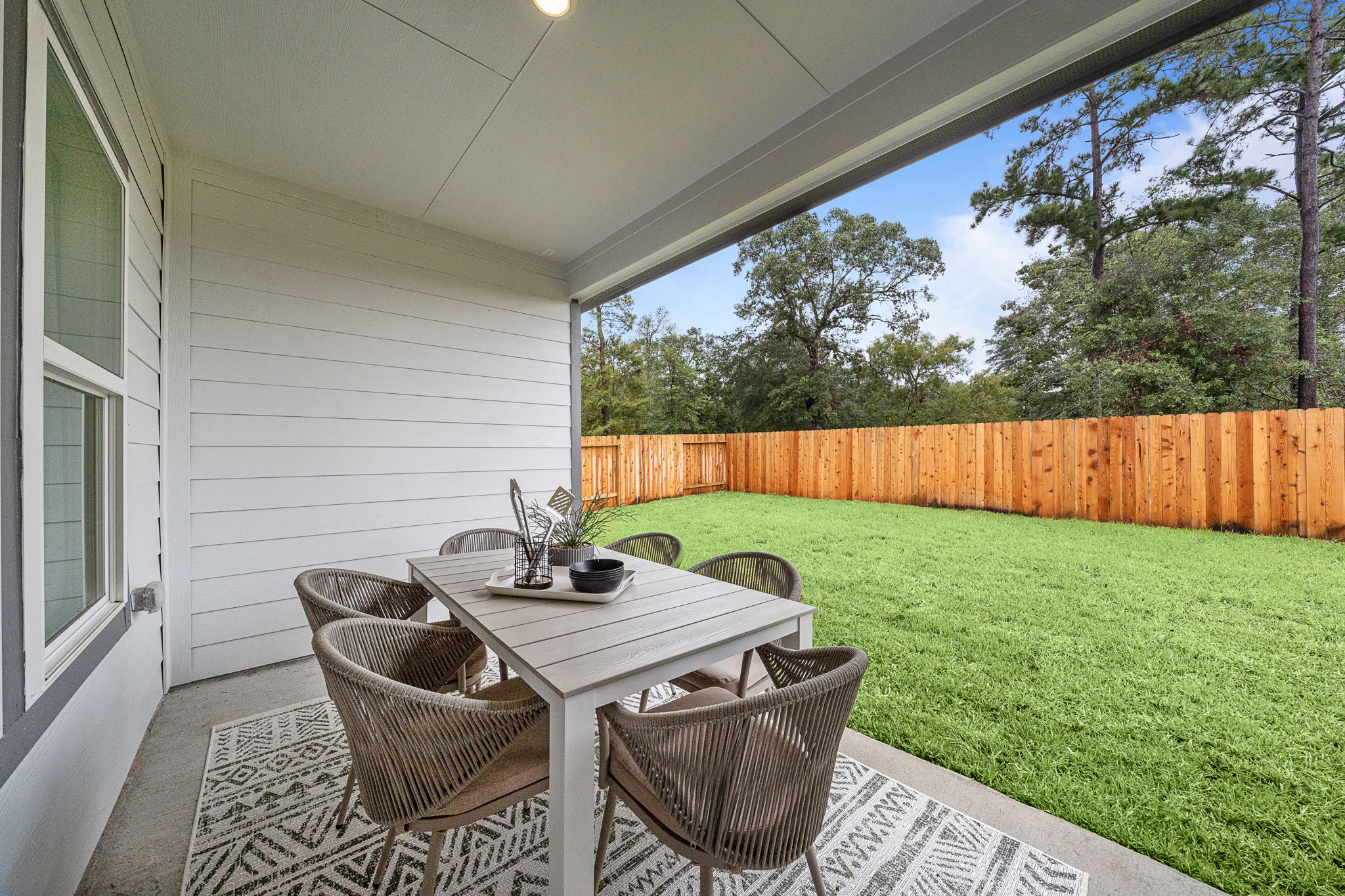 A table and chairs outside.