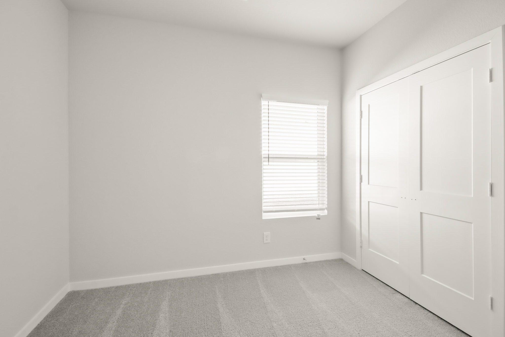 A room with white doors.
