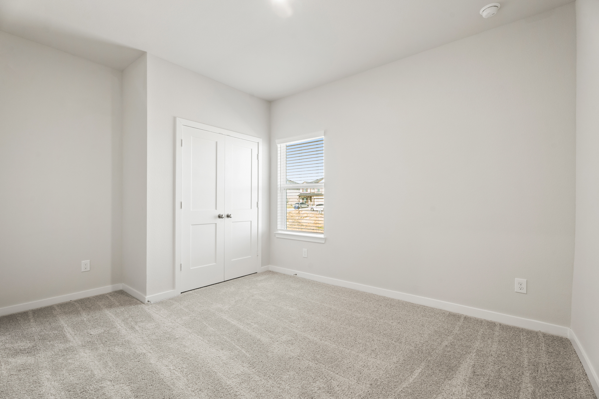 A room with white doors.