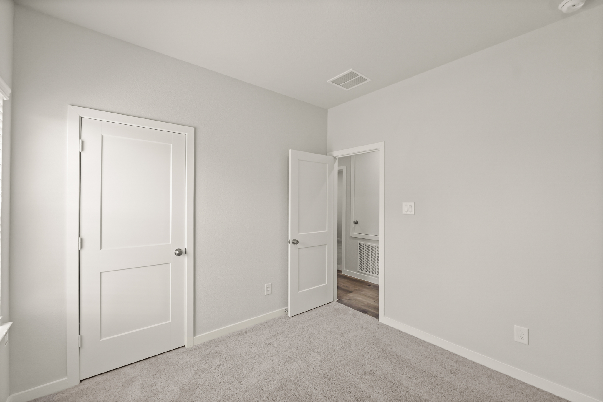 A room with white doors.