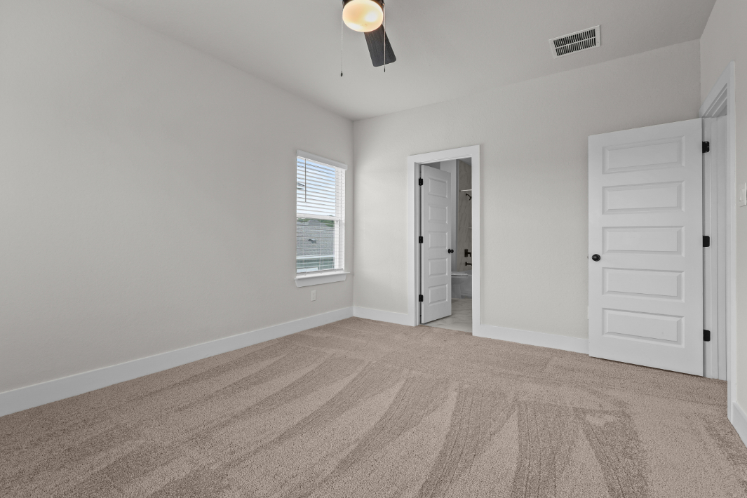 A room with white doors.