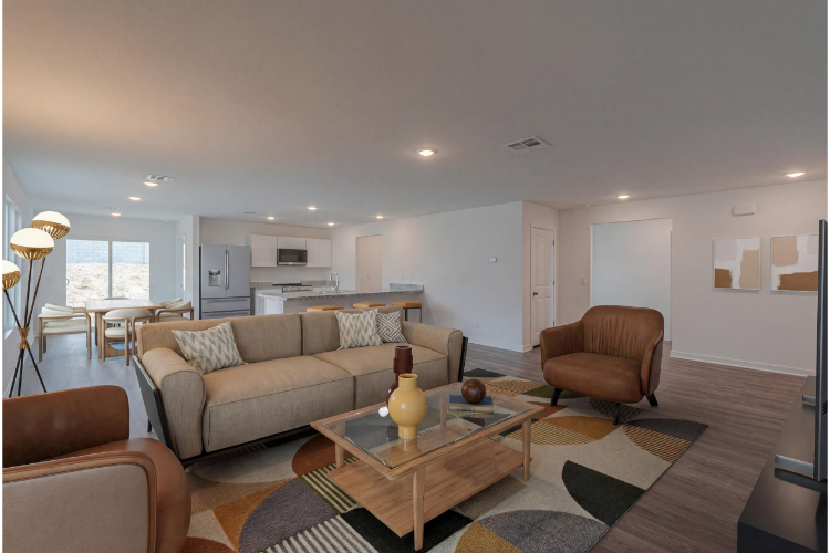 A living room with a couch and a coffee table.