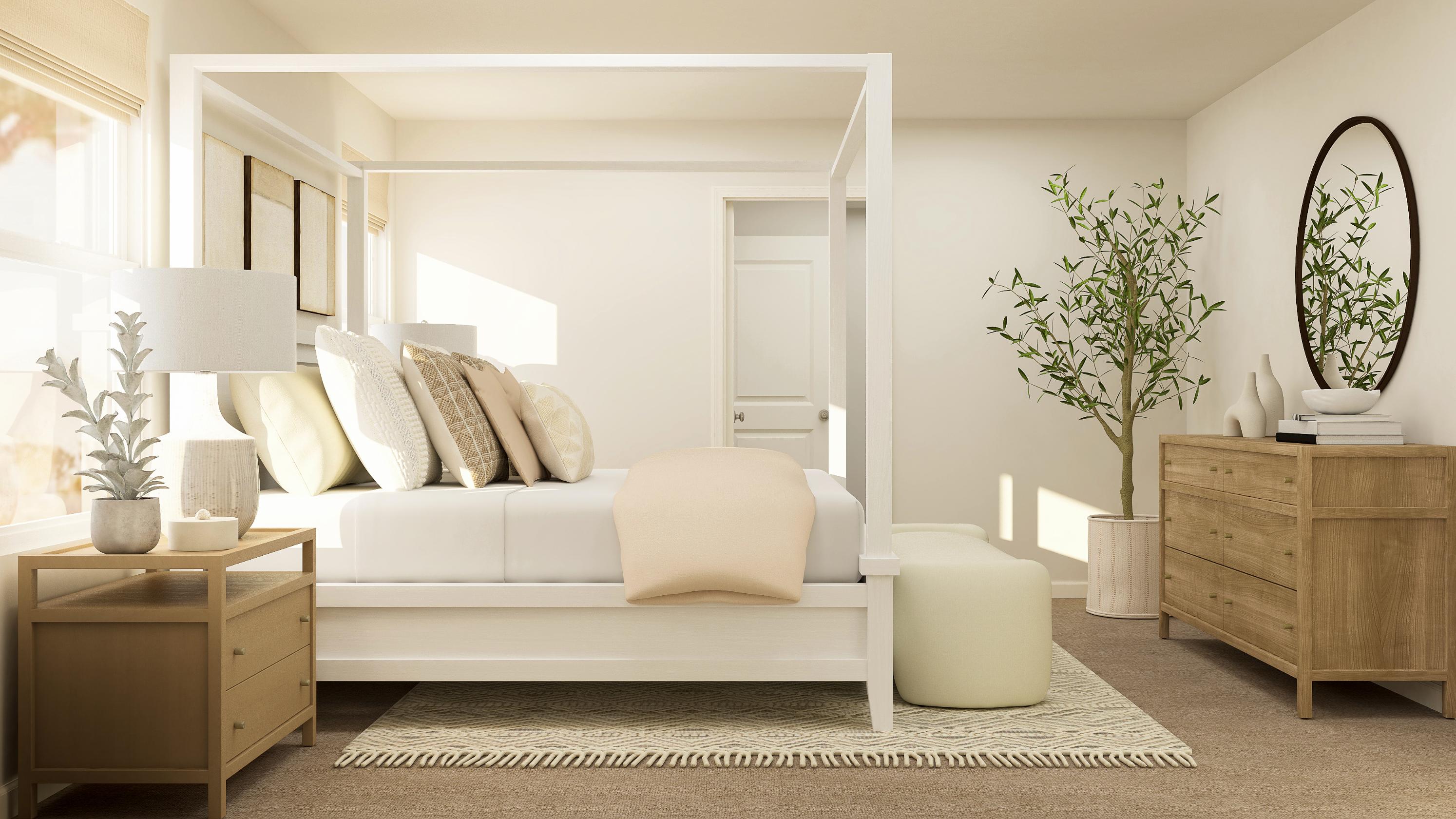 A living room with a white couch and a table.