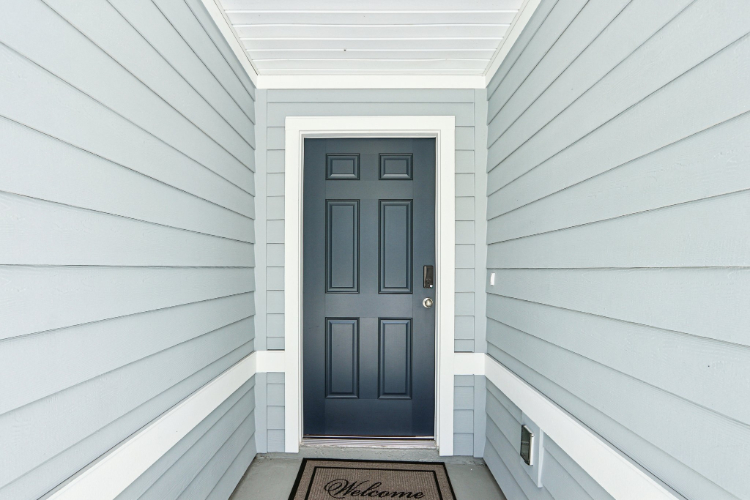 A door in a white building.