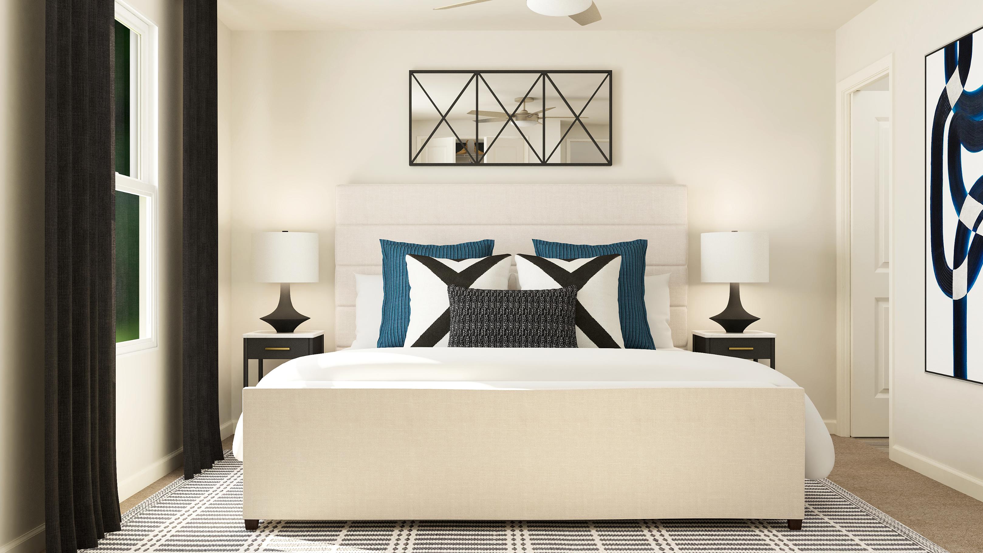 A bed with a blue and white striped blanket.