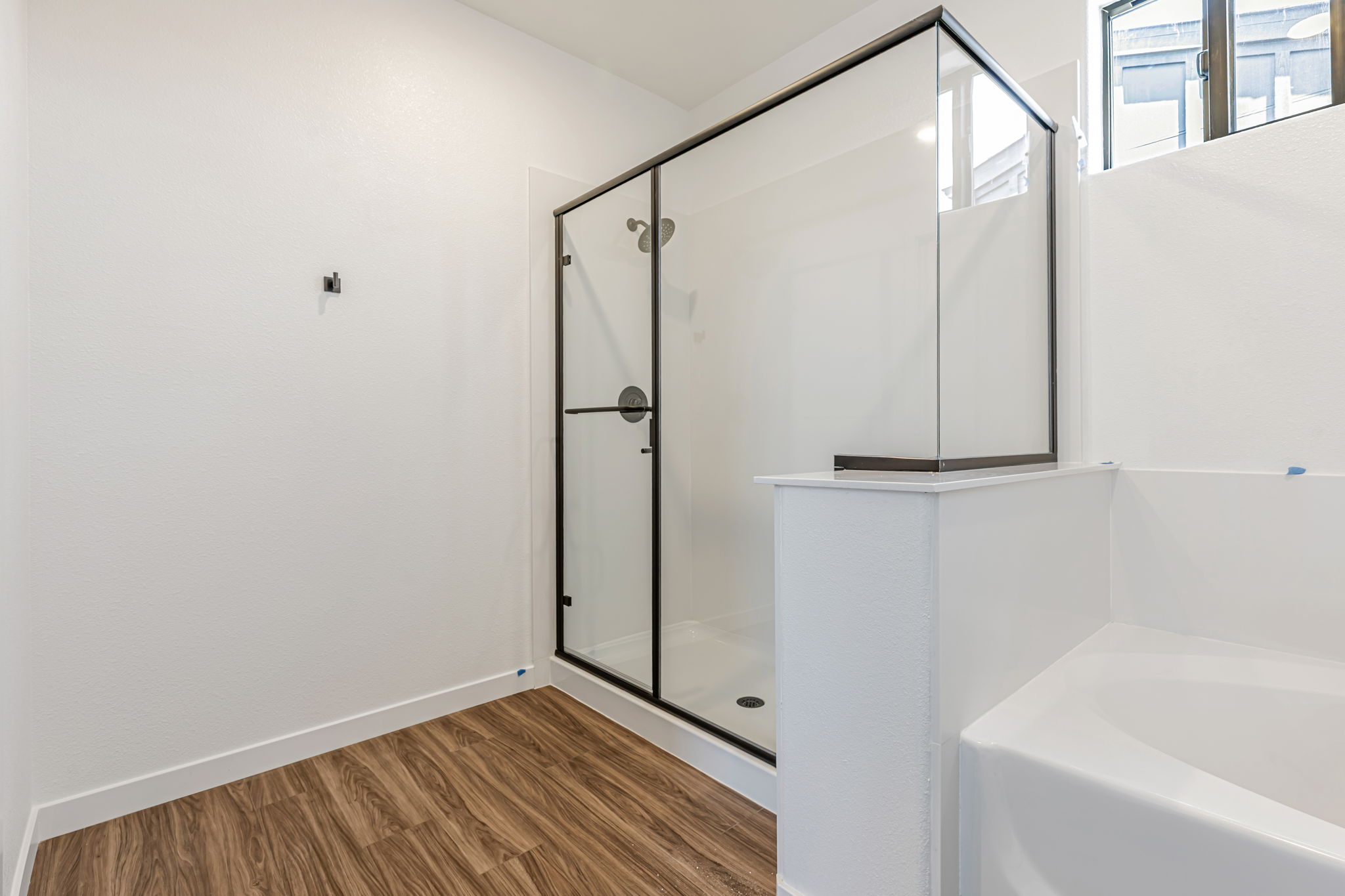 A bathroom with a glass shower.
